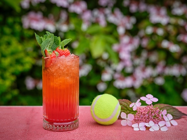 cocktail and tennis ball PR image for Wimbledon themed afternoon tea at Ellenborough Park