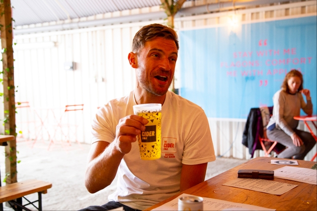 Bristol cider week, man drinking a pint of cider