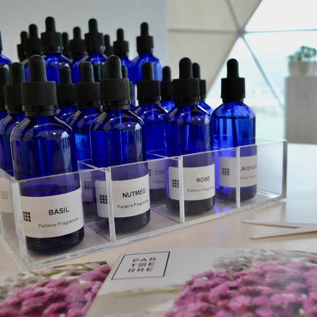 blue parterre fragrance bottles for creating perfume in workshop at Royal Crescent