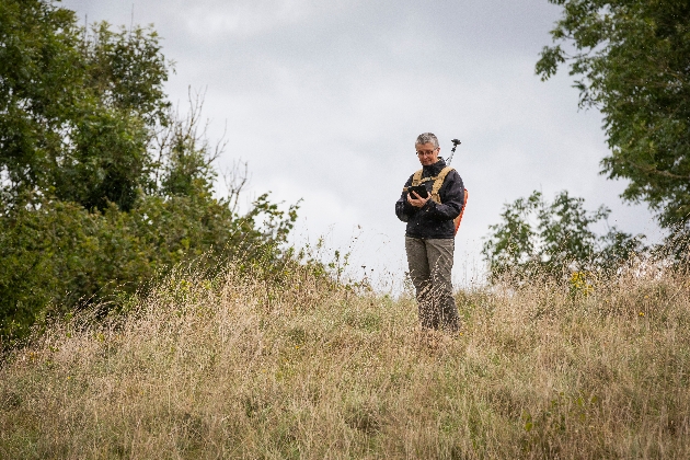Dr Nick Snashall, National Trust Archaeologist, using GPS