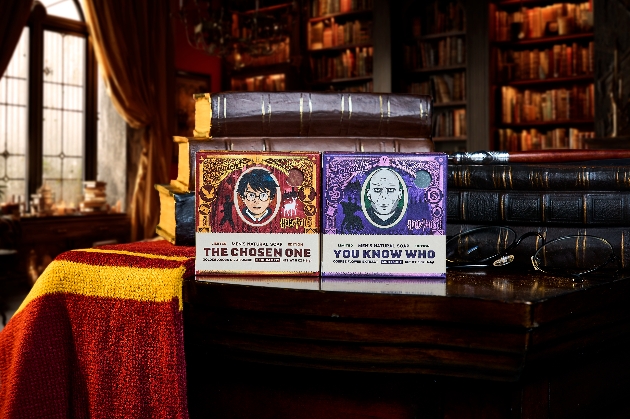 Two Harry Potter bars of soap surrounded by books in a library