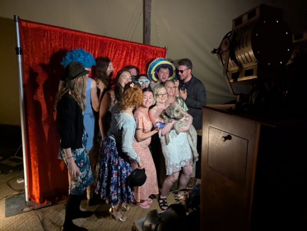 group of people posting for a photo booth