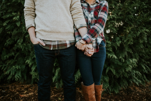 couple shot of man and woman holding hands